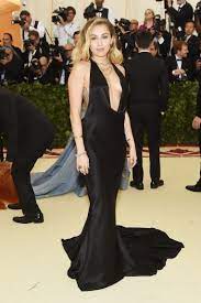 Her ultimate celebrity status with her music and acting raised her net worth in 2018 to $160.0 million, and it's only growing. Met Gala 2018 Miley Cyrus Attends The Met Gala Wearing A Stella Mccartney Dress Teen Vogue