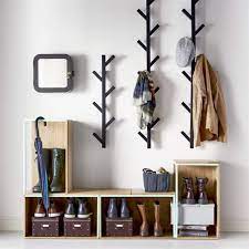 Stylish Practical Entryway With Ikea Tjusig Coat Racks Ps 2014 Stackable Boxes Diy Coat Rack Hallway Storage Coat Storage