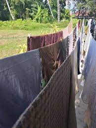 What does baju mean in english? Jangan Tak Tahu Menyidai Baju Pun Ada Seni