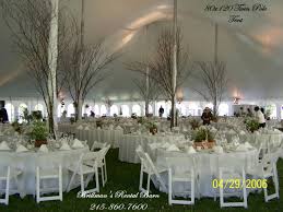 Tree Branches Around The Tent Poles Outdoor Tent Wedding Wedding Tent Tent Pole Decorations