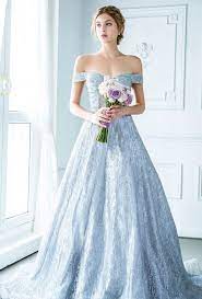 This Off The Shoulder Ice Blue Gown From Digio Bridal Featuring Magical Sparkly Details Is Making Us Swoon Fairy Tale Wedding Dress Fairytale Dress Blue Bridal Dress