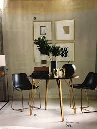 The Modern Table And Chairs Plus The All With 4 Pieces Of Geometric Art Cb2 Modern Table And Chairs Modern Table Decor Inspiration