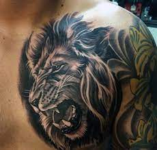 Top 73 Lion Chest Tattoo Ideas 2021 Inspiration Guide Mens Lion Tattoo Lion Tattoo Sleeves Picture Tattoos