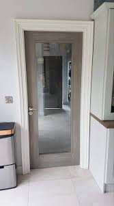 Modern doors go well beyond simple wooden sheets we're used to. Daiken Grey Doors Glass Doors Interior Grey Interior Doors Grey Internal Doors