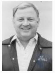 Coach reaches 100th win in football