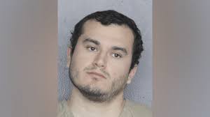 Man arrested after hitting woman with car at gas station: Police