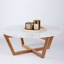 The coffee table's metal frame offers durable, lasting support. This Modern And Contemporary Round Coffee Table Is Part Of Our Marcello Range And Is Crafted In A S Coffee Table Coffee Table Vintage Contemporary Coffee Table