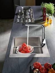 Another idea for a modern kitchen is exposed cabinetry. Trend Inspiration For An Open Plan Kitchen Hansgrohe Int