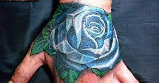 Blue Rose Tattoo On Left Hand Tattoos Rose Tattoos Rose Hand Tattoo