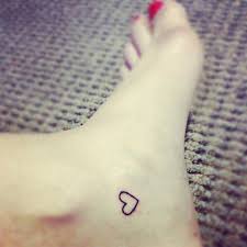 Heart tattoos on the chest area looks amazing. Pin By Maria Luhrs On Infinite Little Heart Tattoos Foot Tattoos Tattoos