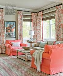 Living Rooms Woven Blinds Striped Rugs Coral Upholstery Floral Print Drapes Courtesy Of House Of Turquoise Aqua Blue Acc Coral Living Rooms Home Home Decor