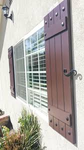 Exterior Shutters Like These Composite Joined Board N Batten Shutters With Decorative Hardware Are Great For Shutters Exterior House Shutters House Exterior