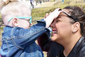 Tina Salas and her son Deklan, 2, play together during