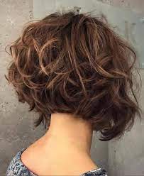 Using hairspray, mousse or gel can help if your hair is particularly unruly or needs smoothing down. A Women S Lifestyle Destination Dedicated To Style Entertainment Love And Living Beautif In 2020 Short Curly Haircuts Short Layered Bob Hairstyles Thick Hair Styles