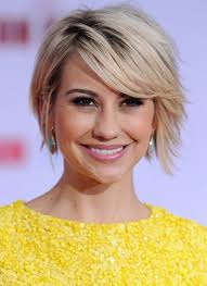 Short and clearly shaped on the sides, this haircut features long and wavy top tresses, combed frontward to melt into soft right side bangs. Short Hair Long Bangs Top 10 Styling Ideas For 2020
