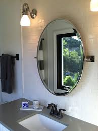 But it's not just that. Bathroom Ideas Framed Oval Home Depot Bathroom Mirrors Above Single Sink Bathroom Vanity Under Round Mirror Bathroom Best Bathroom Designs Bathroom Sink Decor