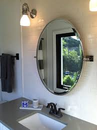 The bathroom is one of the only rooms in a multibodied household where we're expected and encouraged to lock ourselves inside. Bathroom Ideas Framed Oval Home Depot Bathroom Mirrors Above Single Sink Bathroom Vanity Under Round Mirror Bathroom Best Bathroom Designs Bathroom Sink Decor