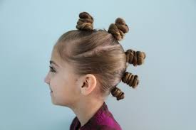Twist up the hair in the pigtails (to hold the hair together) and thread the ends through the holes in the cupcake liners (one at a time.) 4. The Bun Hawk Crazy Hair Day Hairstyles Cute Girls Hairstyles