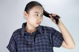 Do you want charming and innocent? Portrait Of Asian Young Woman With Ends Of Long Hair Care Problems Dry Hair And Split Ends Treatment And Hair Care Concept Stock Photo Image Of Expressions Expression 157096272
