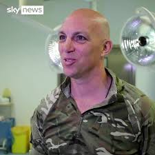 Afghanistan: British Army surgeon used new parenting skills to comfort baby  passed over barbed wire