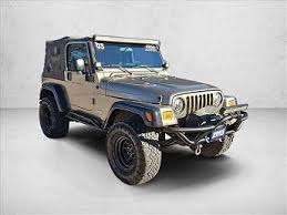 Image result for Brilliant Black 2003 Jeep