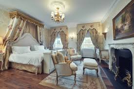 A few pops of orange and blue wake up the room. 75 Beautiful Victorian Bedroom Ideas Designs May 2021 Houzz Uk