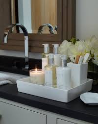 Hot hair tools are some of the most challenging items to tuck away due to the heat they put off and their awkward shapes and sizes. 19 Bathroom Canisters Ideas Bathroom Decor Diy Bathroom Bath Decor