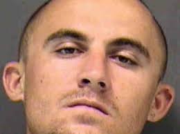 Tattoo incriminates armed robbery suspect