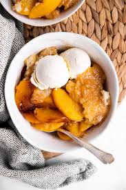 Bake and serve with a scoop of vanilla ice feel free to experiment with the ratios and the fruit in this peach cobbler recipe. Bisquick Peach Cobbler Recipe Unfussy Kitchen