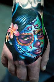 Day Of The Dead Hand Tattoo Hand Tattoos Sugar Skull Tattoos Skull Hand Tattoo