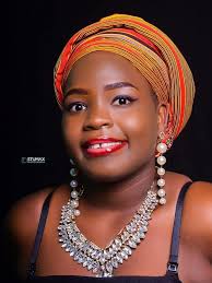 Miss Tourism Uganda-PA added a...