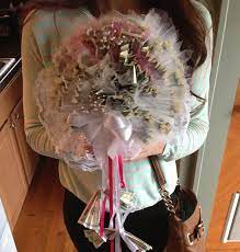 Couples can also find gifts to exchange with one another, gift ideas for parents, and even guests. Bouquet Made Out Of Money The Perfect Bridal Shower Gift Gift Wrapping Inspiration Perfect Bridal Shower Gift Money Gift