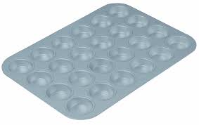 Select from our hand picked collection of cupcake pans, muffin molds and cake pop pans, made for the rigors of the commercial industry but great in home kitchens as. Chicago Metallic Commercial Ii Non Stick 24 Cup Mini Muffin Pan See This Great Image Baking P Chicago Metallic Mini Muffin Pan Chicago Metallic Bakeware
