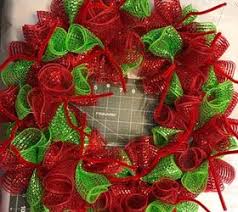 This ribbon wreath tutorial is fun and easy to follow. How To Make Christmas Diy Deco Mesh Wreath Hometalk