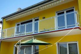 Glass Panel Balcony Railing Simple Elegant And Safe Simplified Building