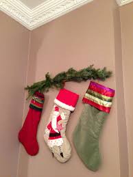 Here are some great ways to hang christmas stockings without a fireplace mantle. Hanging Stockings Without A Mantle Decorated Stockings Felt Christmas Stockings Hanging Stockings