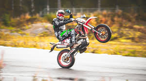 Grenzgaenger wheelie wheelies ride supermoto stunt motorcycle motorbike bike onewheel wheel orange deser motocross bikes ktm supermoto super bikes. Wheelie Wallpapers Wallpaper Cave