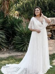 Kelly Plus Size Wedding Dress With Flutter Sleeves From Studio Levana Plus Size Wedding Gowns Plus Wedding Dresses Couture Wedding Gowns
