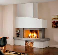 Rivestire un camino ad angolo ecco 20 idee da cui trarre ispirazione corner fireplace makeover fireplace design home fireplace. Rivestimento Per Camini Moderno Santiago Palazzetti Lelio In Pietra Ad Angolo