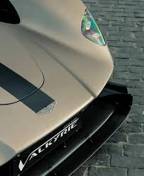 Image result for Satin Solar Bronze 2023 Aston Martin