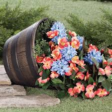 125 Best Spilled Flower Pots For Amazing Atmosphere In The Garden 17 Thereds Me Flower Pots Barrel Planter Barrel Flowers