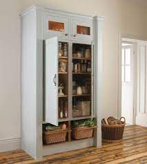 Dover white kitchen pantry a blend of urban farmhouse style with the a blend of urban farmhouse style with the traditional bun foot design. Kitchen Long Kitchen Cabinets Corner Pantry In Kitchen Storage Kitchen Pantry Cabinet Freestanding Free Standing Kitchen Cabinets Pantry Cabinet Free Standing
