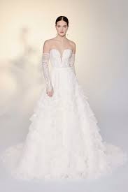 Sometimes it is difficult to choose only one bridal dress for a wedding day. Skirt Drama Wedding Gowns Justin Alexander Signature