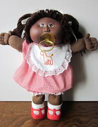 Dolls with adoption papers are worth more the original dolls sold for rrp $30 in the '80s but today, some cabbage patch dolls with birth certificates and adoption papers are fetching into the hundreds. Reserved For Lovediane112712 Vintage Cabbage Patch Kid Doll Black Girl Brown Eyes Pacifier Cabbage Patch Kids Dolls Cabbage Patch Kids Cabbage Patch Dolls