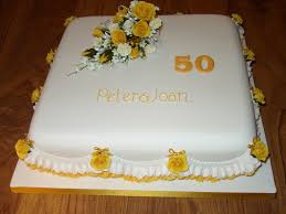 50th wedding anniversary cake this is a 6, 8 & 10 inch cake, all vanilla cakes, they are filled with vanilla buttercream, mandarin. 50th Wedding Anniversary Cake With Gold Rose Spray Susie S Cakes