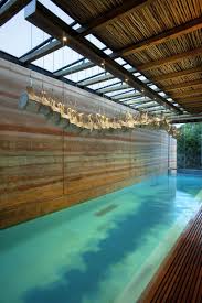 Indoor Lap Pool With Rammed Earth Wall Whale Bone Chandalier Dalrymple Pavilion Westcliff Silvio Rech A Hotel Design Maisons Contemporaines Modele Maison