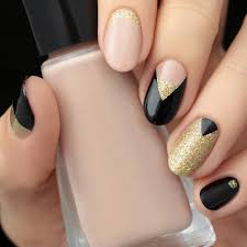 Next, we have a cute black and gold idea. Mani Monday Gold And Black Nail Tutorial Lulus Com Fashion Blog