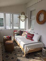 Beach House Porch With Boho Daybed Lots Of Pillows Hanging Jute Rope Lamp Summer Porch Daybed Ikea T Daybed In Living Room Boho Living Room House Interior