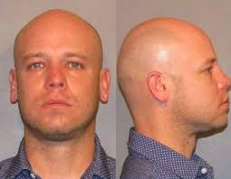 Former SPD officer convicted of malfeasance in office