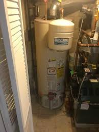 Twist the electric cable with the red and black wires Pipe Works Services Inc Water Heaters Electric Tankless Hot Water Heater Installation In West Orange Nj